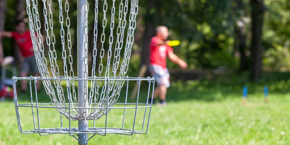 Man,Playing,Flying,Disc,Golf,Sport,Game,In,The,City